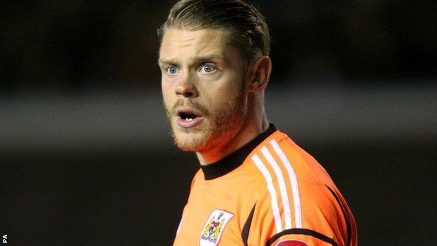 Dean Gerken BBC Sport Ipswich Town Dean Gerken signs after Bristol