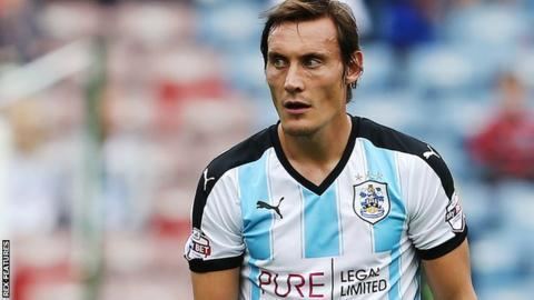 Dean Whitehead Dean Whitehead Huddersfield Town midfielder opts to stay after