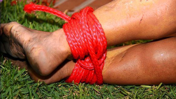 Rebecca Zahau' feet tied in a rope