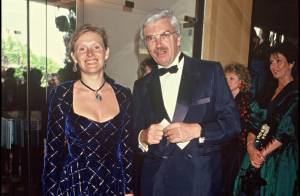 Sophie Toscan du Plantier smiling and wearing a blue dress while Daniel Toscan du Plantier wearing a black suit and a bowtie.