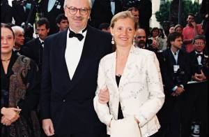 Sophie Toscan du Plantier smiling and wearing a white blazer while Daniel Toscan du Plantier wearing a black suit and a bowtie.