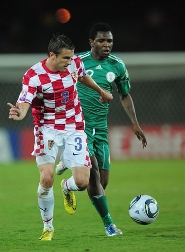 Dejan Glavica Dejan Glavica of Croatia battles with Terna Suswan of Nigeria FIFAcom