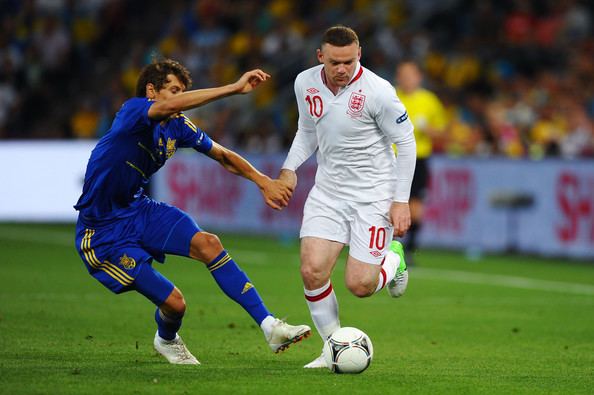Denys Harmash Wayne Rooney and Denys Harmash Photos England v Ukraine