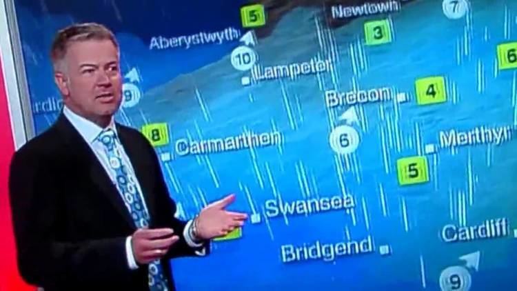 Derek Brockway Derek Brockway being interupted presenting the weather on BBC Wales