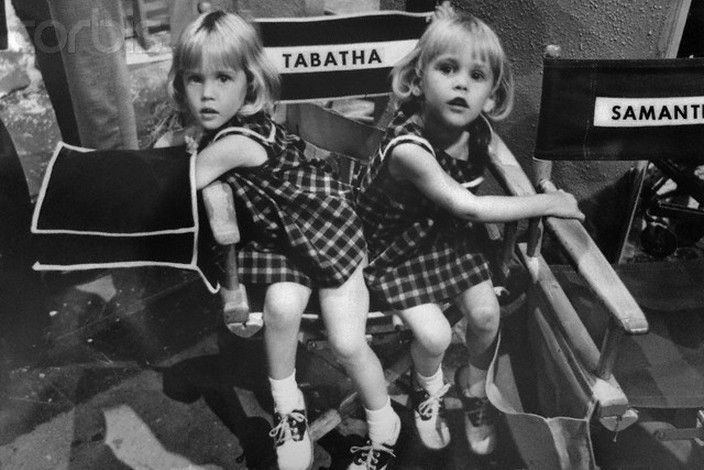 Diane Murphy with her twin sister Erin wearing checkered dress