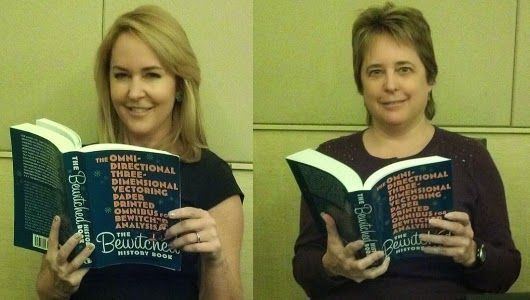 Diane Murphy and Erin Murphy while holding The Bewitched History Book