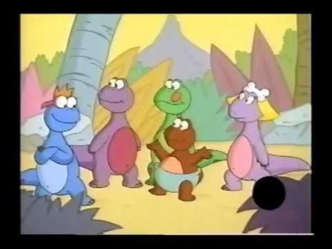 Truman, Franklin, Stanley, Marshall, LaBrea are all smiling in a scene from the 1994 children's animated television series, Dino Babies