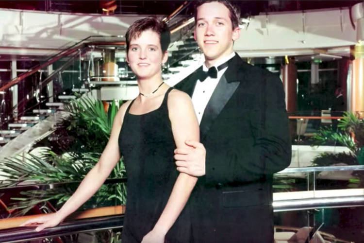Amy Lynn Bradley wearing a black dress and her brother Brad wearing a black coat, white long sleeve and bow-tie