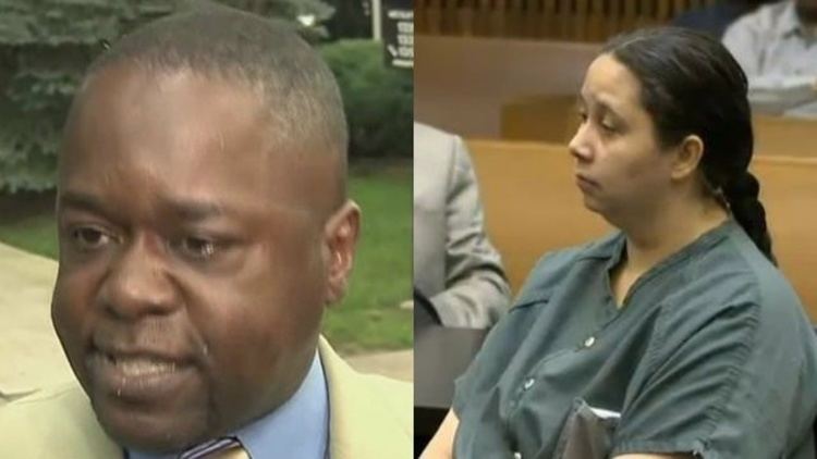 Charlie Bothuell IV (left) is angry, has black hair, wearing blue long sleeves under a tan-colored suit. Monique Dilliard-Bothuell (right) is serious, has black braided hair, and sitting down on a brown bench on the court, wearing a dark green top with a pocket.