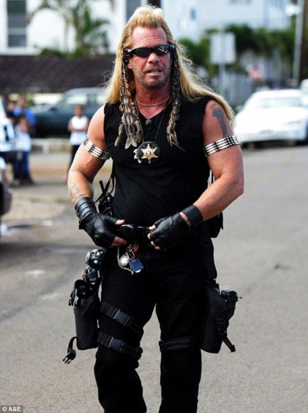 Dog the Bounty Hunter Duane 39Dog39 Chapman 63 leans on walking stick as famed bounty