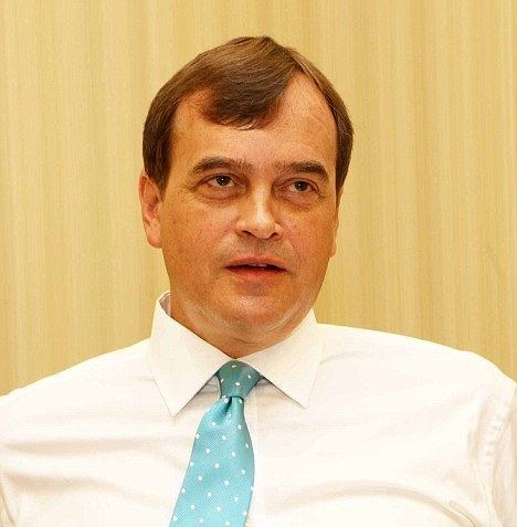 Dominic Asquith British ambassador to Libya escapes uninjured after his convoy is