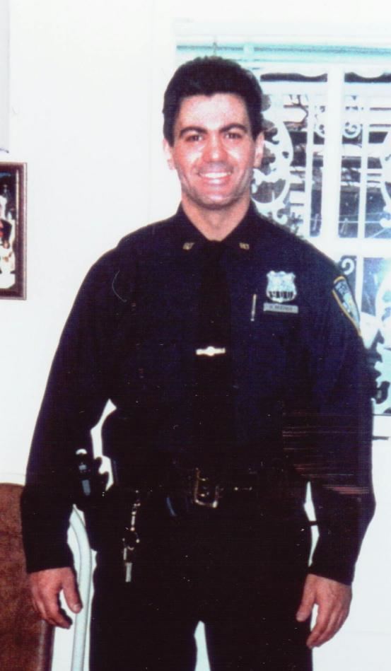 Dominick Pezzulo smiling and wearing the complete uniform of the PAPD Officers.
