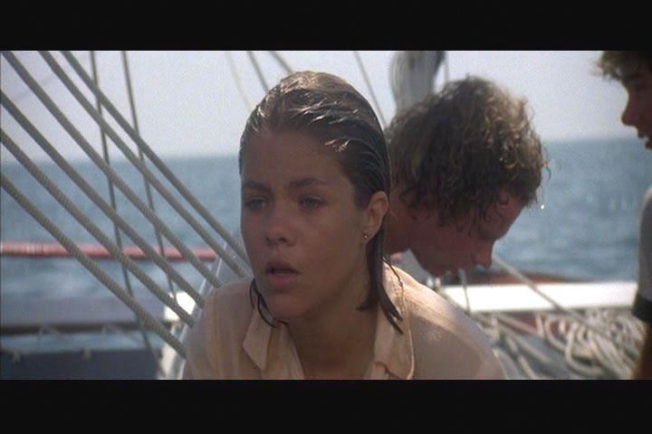 Donna Wilkes as Jackie Peters being wet in a boat in a movie scene from the movie Jaws 2, 1978.
