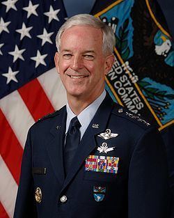 Douglas M. Fraser smiling and wearing the air force commander uniform