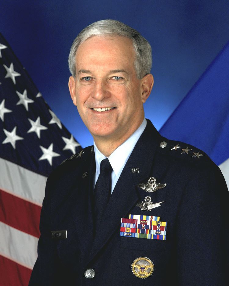 Douglas M. Fraser smiling and wearing air force commander uniform