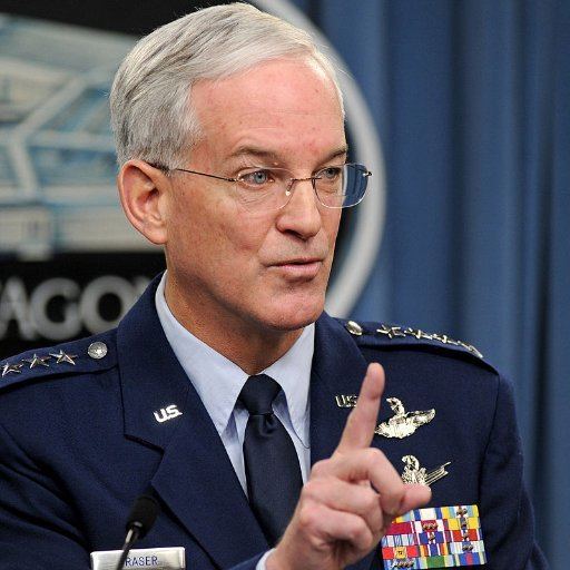 Douglas M. Fraser pointing his finger and wearing the air force commander uniform
