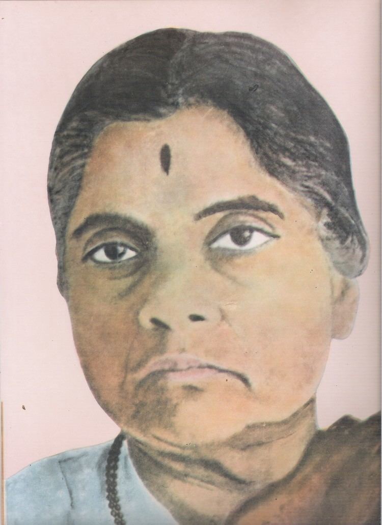 A sketch of Durgabai Deshmukh (July 15, 1909- May 9, 1981) looking serious with gray hair and a tika on her forehead and wearing a saree
