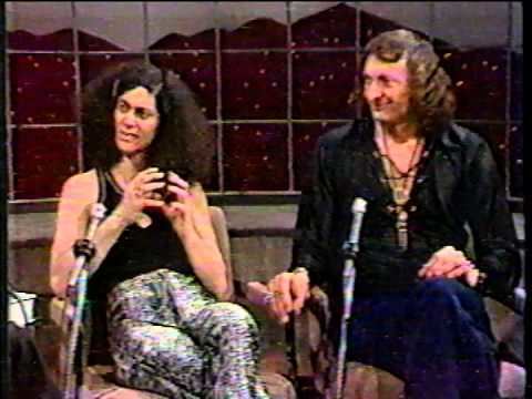 Durk Pearson smiling with Sandy Shaw while sitting on the chair during their interview