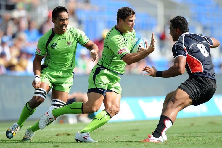 Ed Jenkins (rugby union) Australia39s Ed Jenkins looks to fend off Sione Faamao