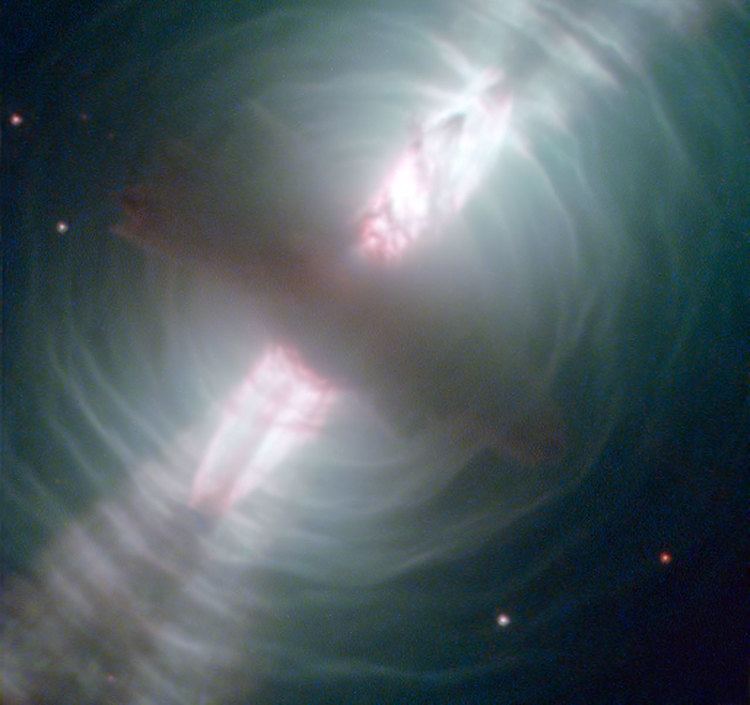 Egg Nebula NASA Hubble Images Searchlight Beams from a Preplanetary Nebula