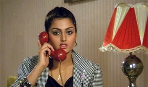 Ekta Sohini holding a red telephone