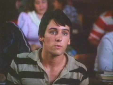 Eric Brown in the movie "Playing with fire" wearing a stripe shirt