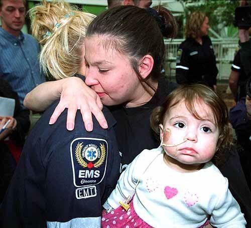 Erika Nordby Photo AP Photo Leyla Nordby hugs EMT Tammy Hills while