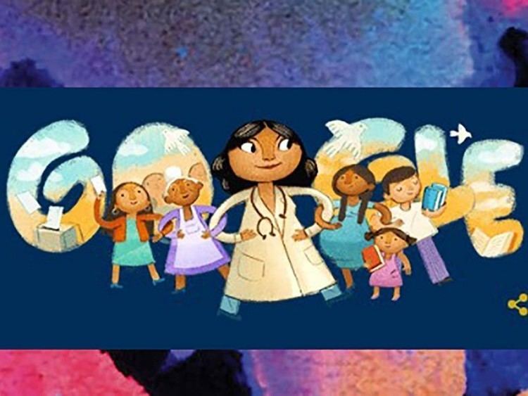The Google search display depicts Google on a dark blue background with boxes, papers, and white birds flying. In front is a group of women holding their arms together and a man on the right, from left, a woman is smiling, standing with her hand up holding a paper, has brown hair, and is wearing a blue dress under a red coat with blue shoes. 2nd from left, Grandma is smiling, standing, holding onto others with both arms, and has white hair. She is wearing a purple dress underneath a white apron. 3rd from left, Woman standing with both arms holding others, wearing a white doctor's coat with a medical stethoscope around her neck and blue pants. 4th from left, A pregnant woman standing with both arms holding others has brown hair and is wearing a blue dress. 5th from left, A kid is smiling standing, holding a red book, has black hair wearing a pink dress, At the right, a man is smiling standing, holding to others with his right arm and left arm holding a blue book. He has black hair and is wearing a white shirt and purple pants.