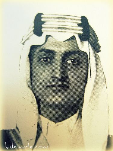 King Faisal of Saudi Arabia with a serious face and wearing a ghutra and egal.