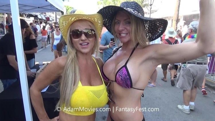 Two women wearing a swimsuit at Fantasy Fest