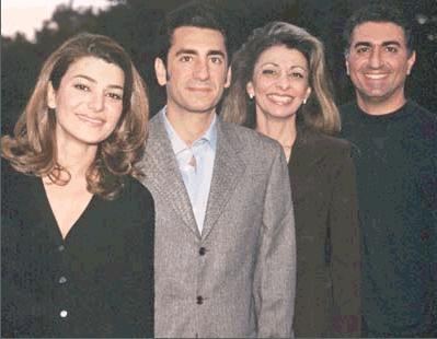 Princess Leila in her black coat, Prince Ali Reza wearing gray coat and long sleeves, Princess Farahnaz in her green coat and Prince Reza wearing black sweatshirt