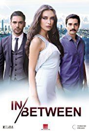 Kadir Doğulu, Neslihan Atagül and Yunus Emre Yildirimer on poster of 2013 tv series, Fatih Harbiye