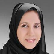 Fatima bint Mubarak Al Ketbi smiling while wearing black hijab