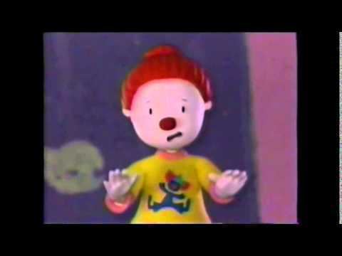 JoJo Tickle with red hair and wearing a yellow shirt in a scene from the American stop-motion musical Comedy series, Feeling Good with JoJo