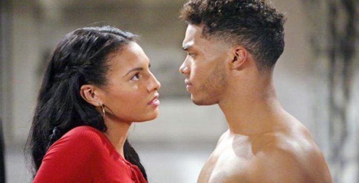 Felisha Cooper and Rome Flynn looking at each other