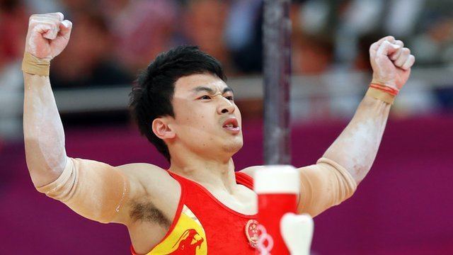 Feng Zhe Olympics gymnastics Feng Zhe wins parallel bars gold