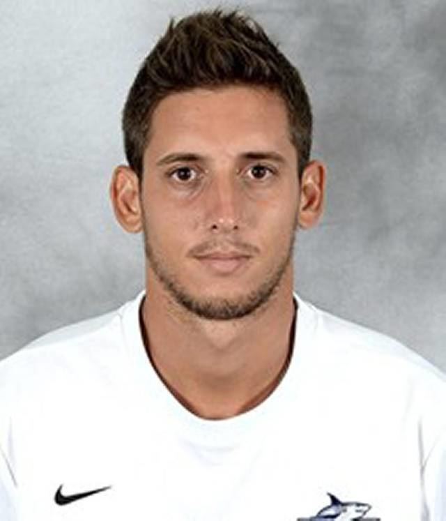 Filippo Mancini's headshot while wearing a white t-shirt