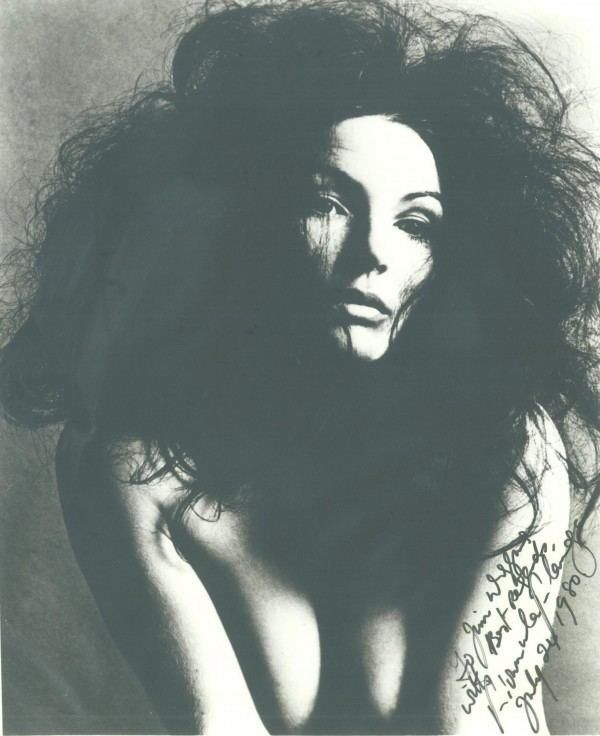 A younger Fionnula Flanagan posing naked and with messy hair.