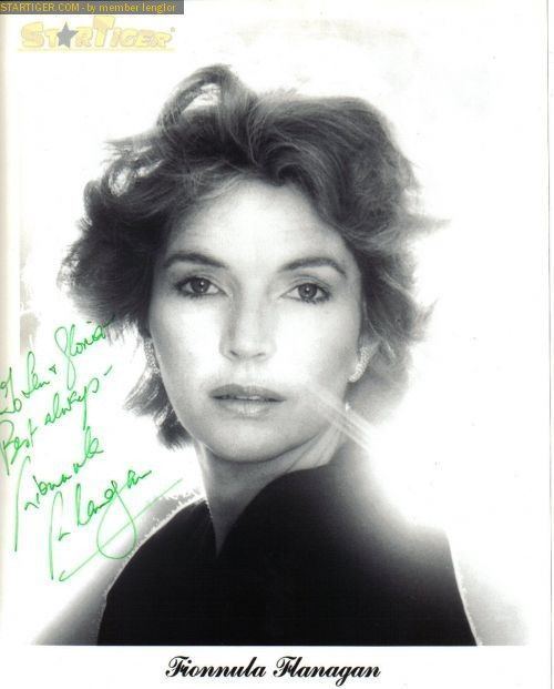 A portrait of a younger Fionnula Flanagan with short hair and wearing a black shirt.
