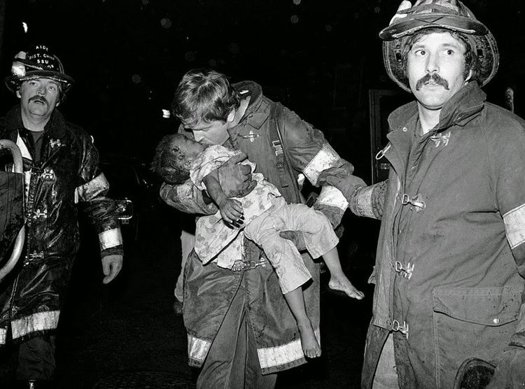 A fireman carrying Tiare Jones, he survived the fall as she had landed on Diana Bryant’s body that softened the impact