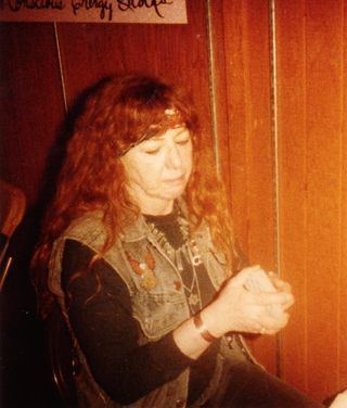 Florence Tullis wearing vest and black long sleeves