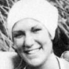 Florence Tullis smiling while wearing bandana