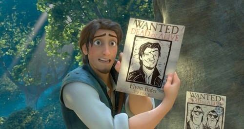 Scene from Tangled featuring Flynn Rider holding a poster with his picture on it.