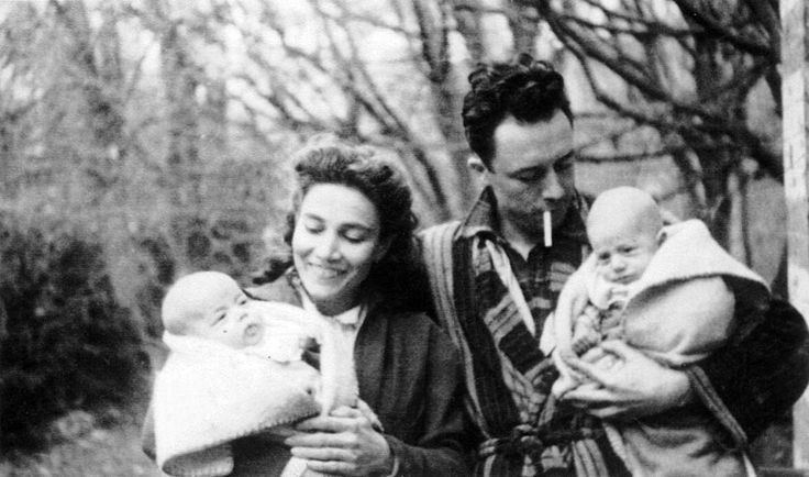 Francine Faure looking happy together with his husband Alburt Camus while carrying their kids