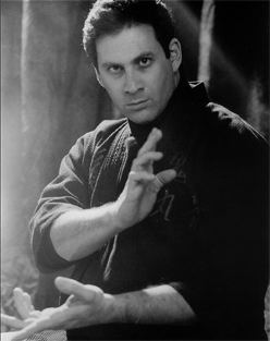 Frank Dux' serious face while doing a martial arts pose