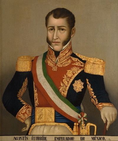 Portrait of Agustín de Iturbide wearing a military uniform, a black, gold, and red long sleeves with epaulettes, military sash, and blue and gold belt