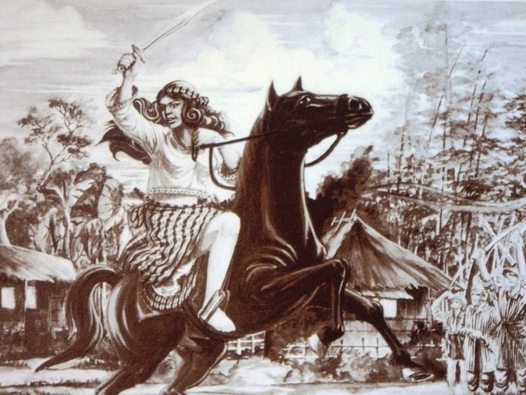 An illustration of Gabriela Silang riding a black horse and raising a machete.