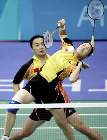 Gao Ling Zhang Jun and Gao Ling of China take badminton mixed