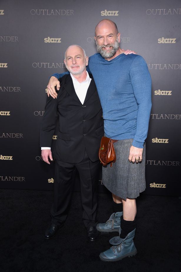 Graham McTavish smiling with Gary Lewis at the "Outlander" mid-season New York premiere at Ziegfeld Theater