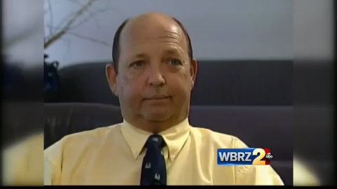 Gary Plauche wearing yellow long sleeves and black neck tie